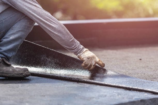 Professional Waterproofing technician working in Lawrenceburg, IN